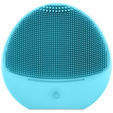Turquoise silicone sonic face brush